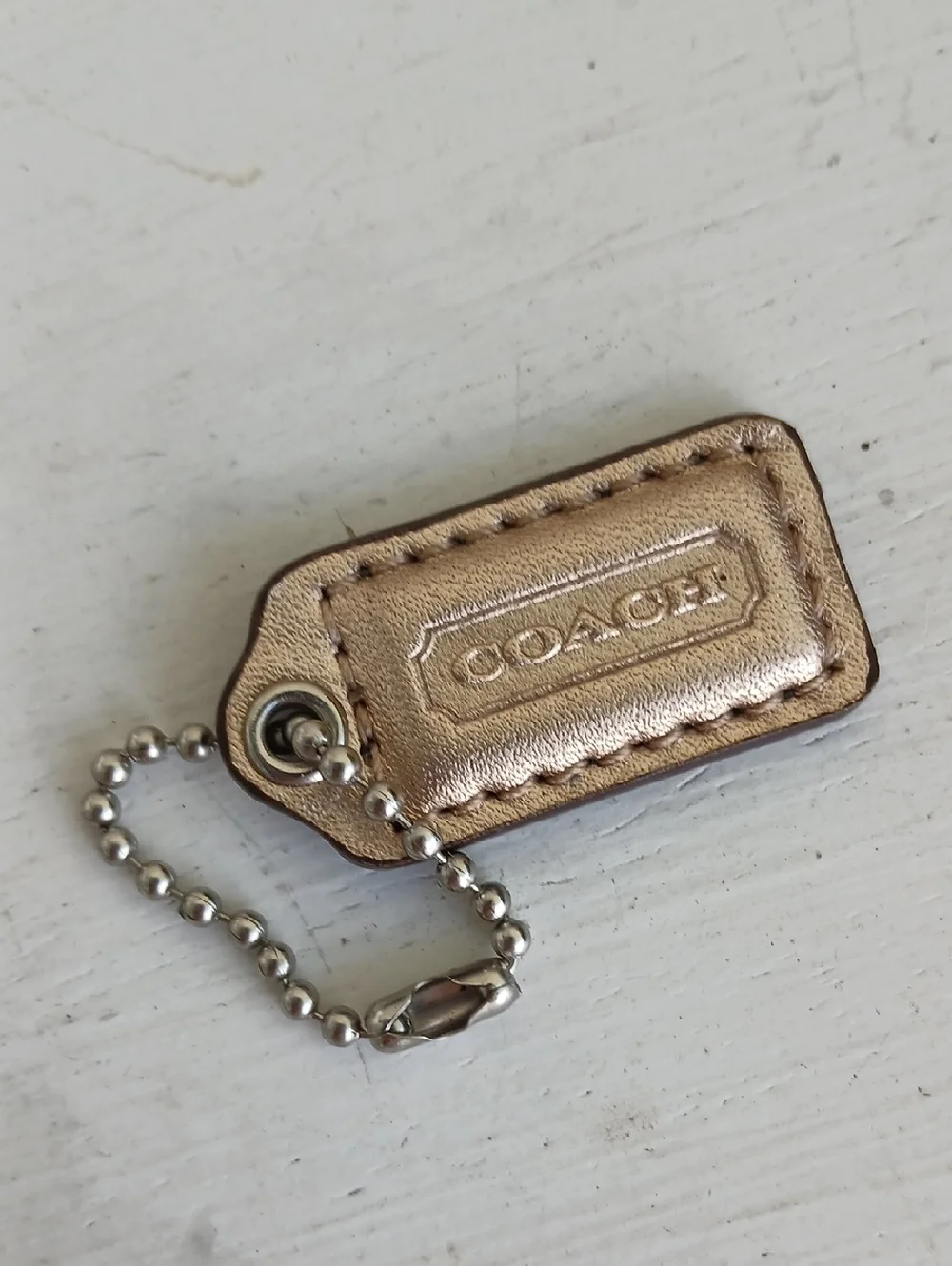 COACH Hang Tag Gold